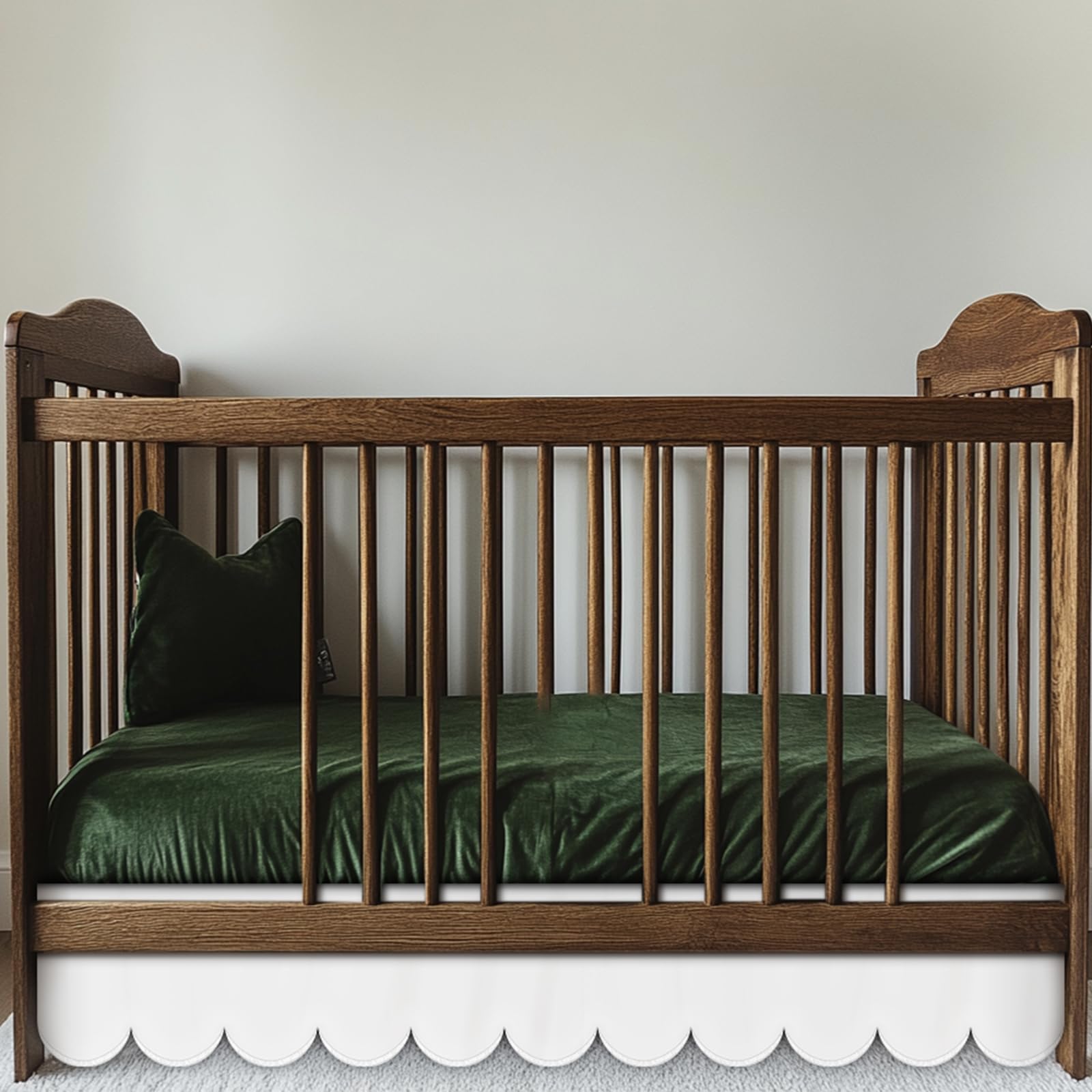 Hahafelt white scalloped crib skirt front view shows timeless design
