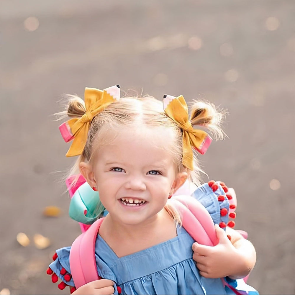 HAIMITI pencil hair bow worn by child, versatile for all ages.