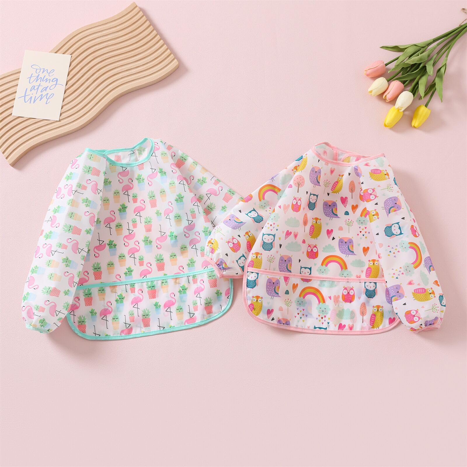 HaimoBurg smock bib with catch-all pocket keeps floors cleaner
