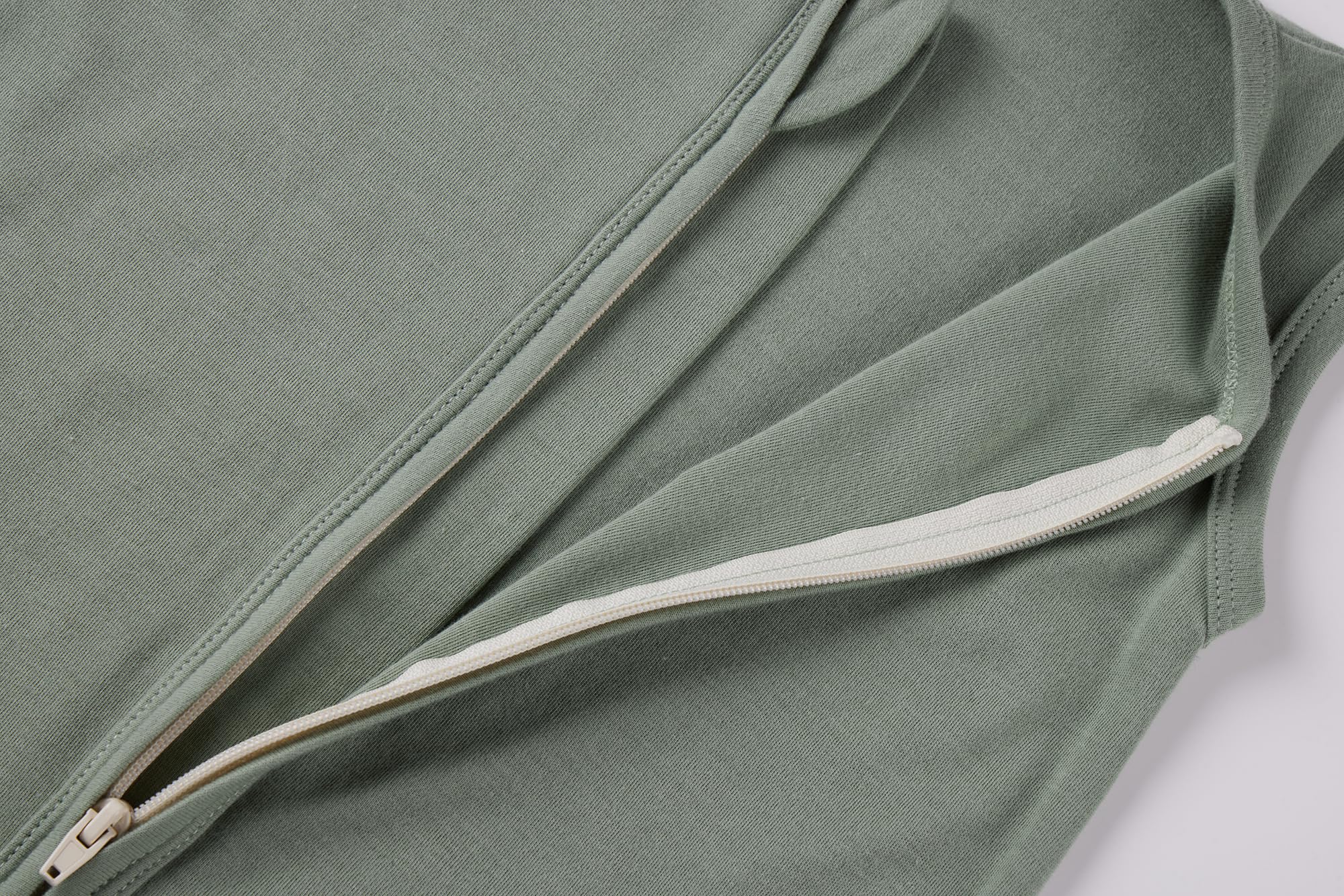 HAJAKADAS-Y baby wearing sleep sack: cozy cotton comfort at bedtime.