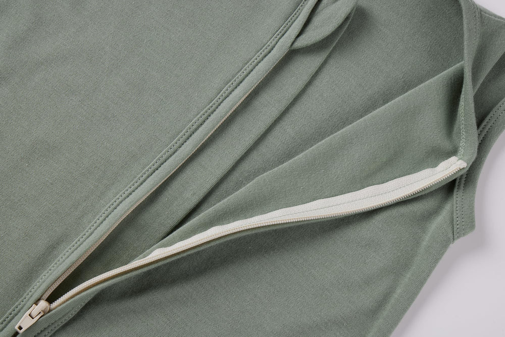 HAJAKADAS-Y baby wearing sleep sack: cozy cotton comfort at bedtime.
