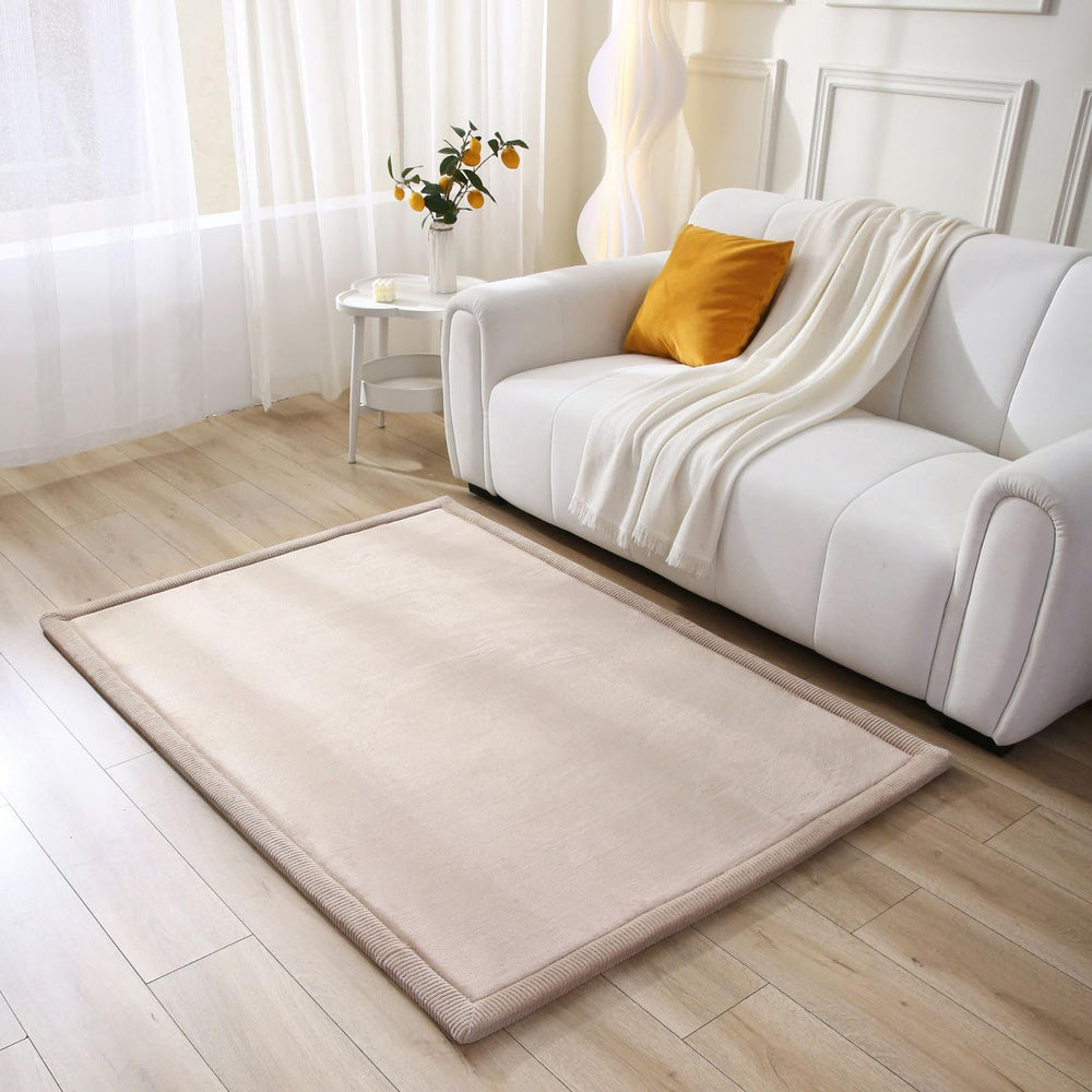 Hakuna Matte CloudSoft baby play mat in beige coral velvet for comfy tummy time.