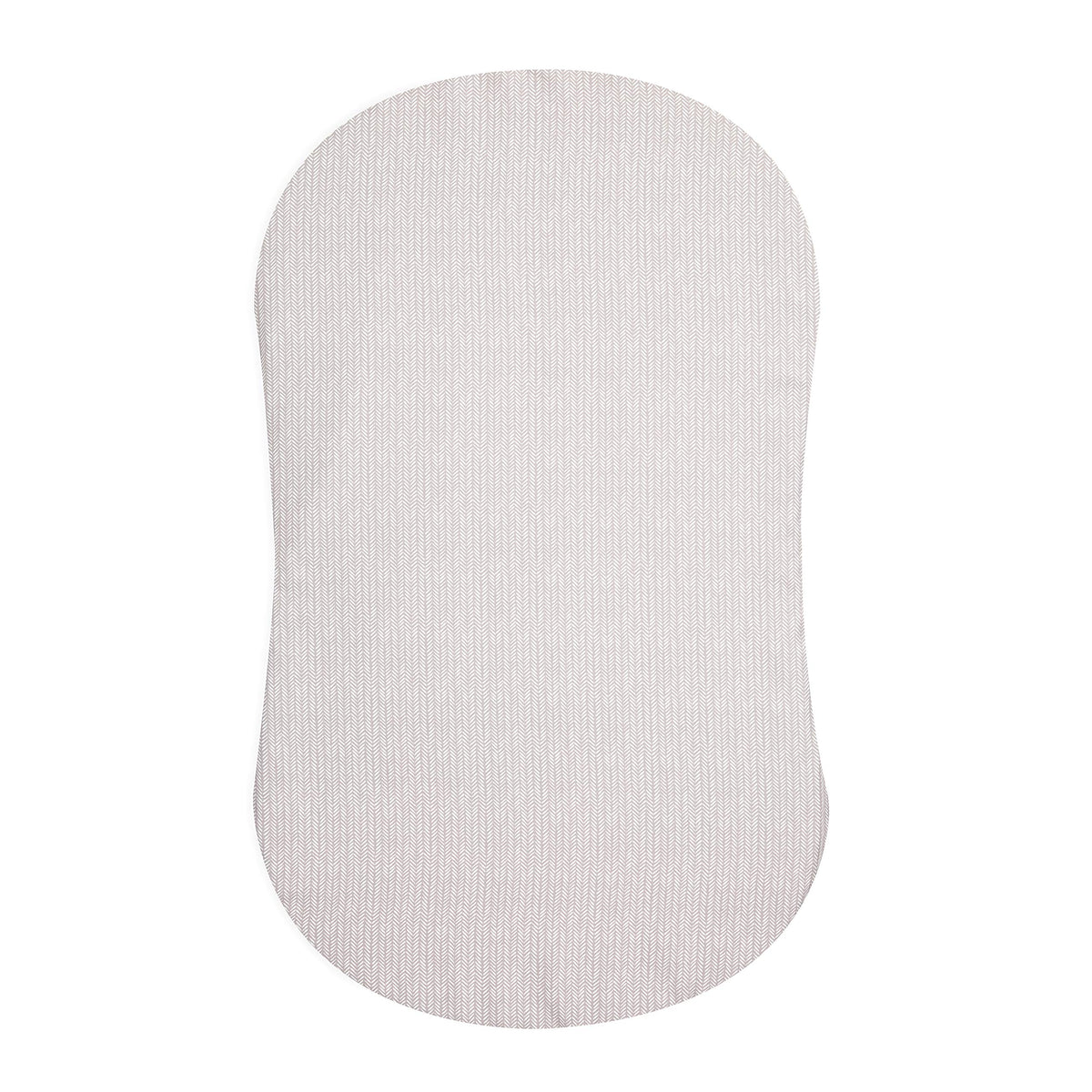 HALO BassiNest fitted sheet on pad offers secure fit and quick changes.