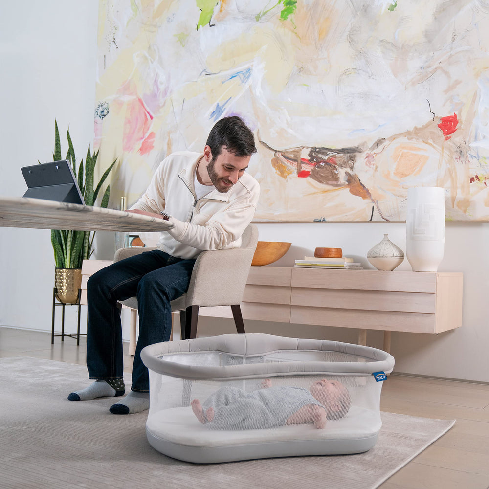 HALO BassiNest height-adjustable to fit beds up to 30 inches.