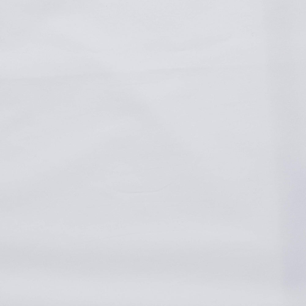HALO BassiNest sheet displayed on 30x16 white bassinet pad