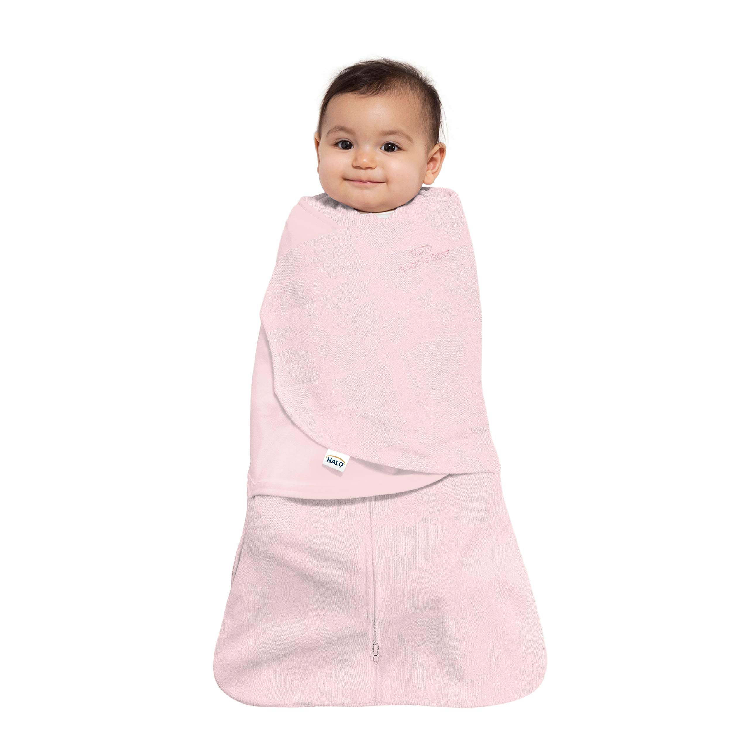 HALO Sleepsack Swaddle hands-to-face shows versatile sleep positions for newborns.