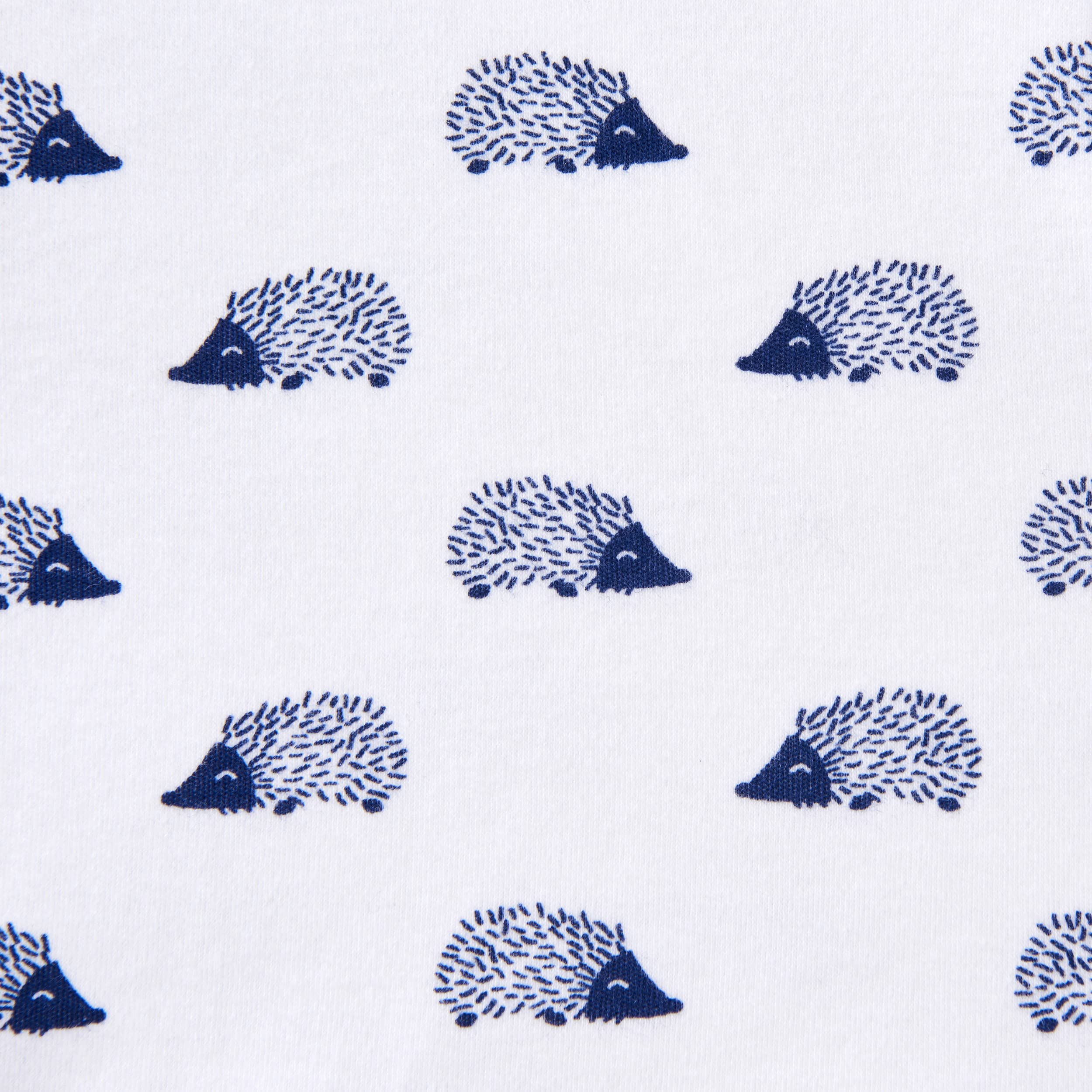 HALO navy hedgehog swaddle supports easy diaper changes