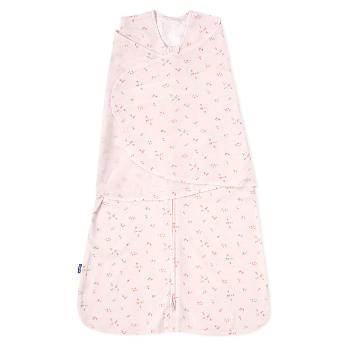 HALO Sleepsack Swaddle pink floral fabric close-up showing soft cotton texture for cozy newborn comfort.