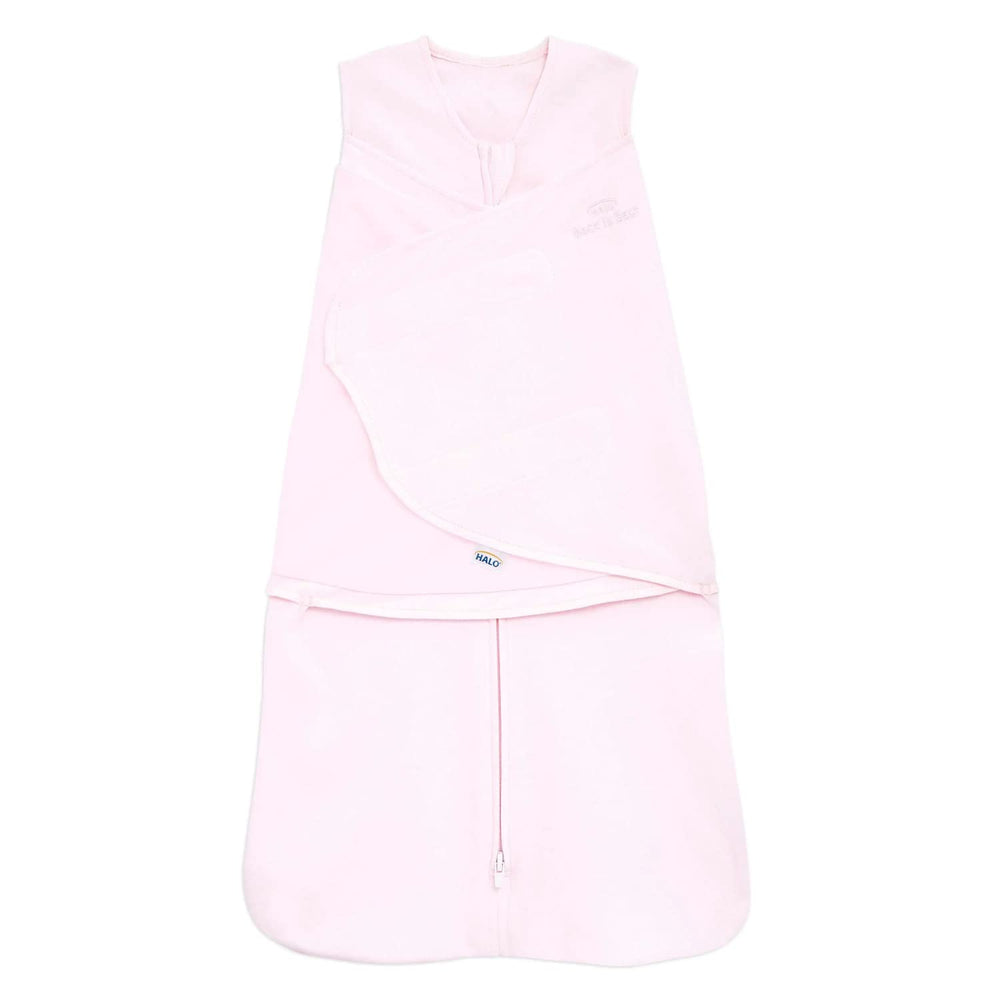 HALO Sleepsack Swaddle in soft pink, front view, secure sleep for newborns.