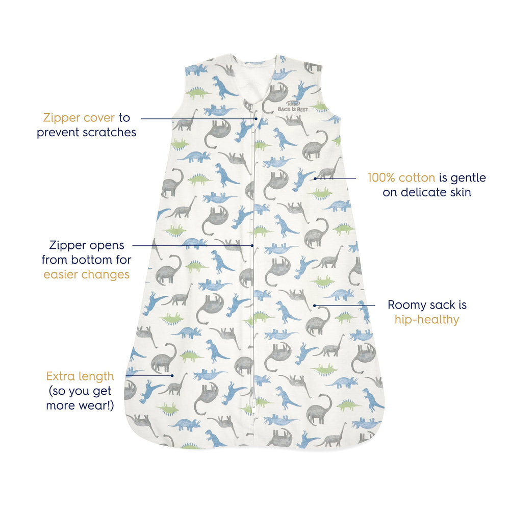 HALO SleepSack Watercolor Dinos baby sleeping cozily in a crib