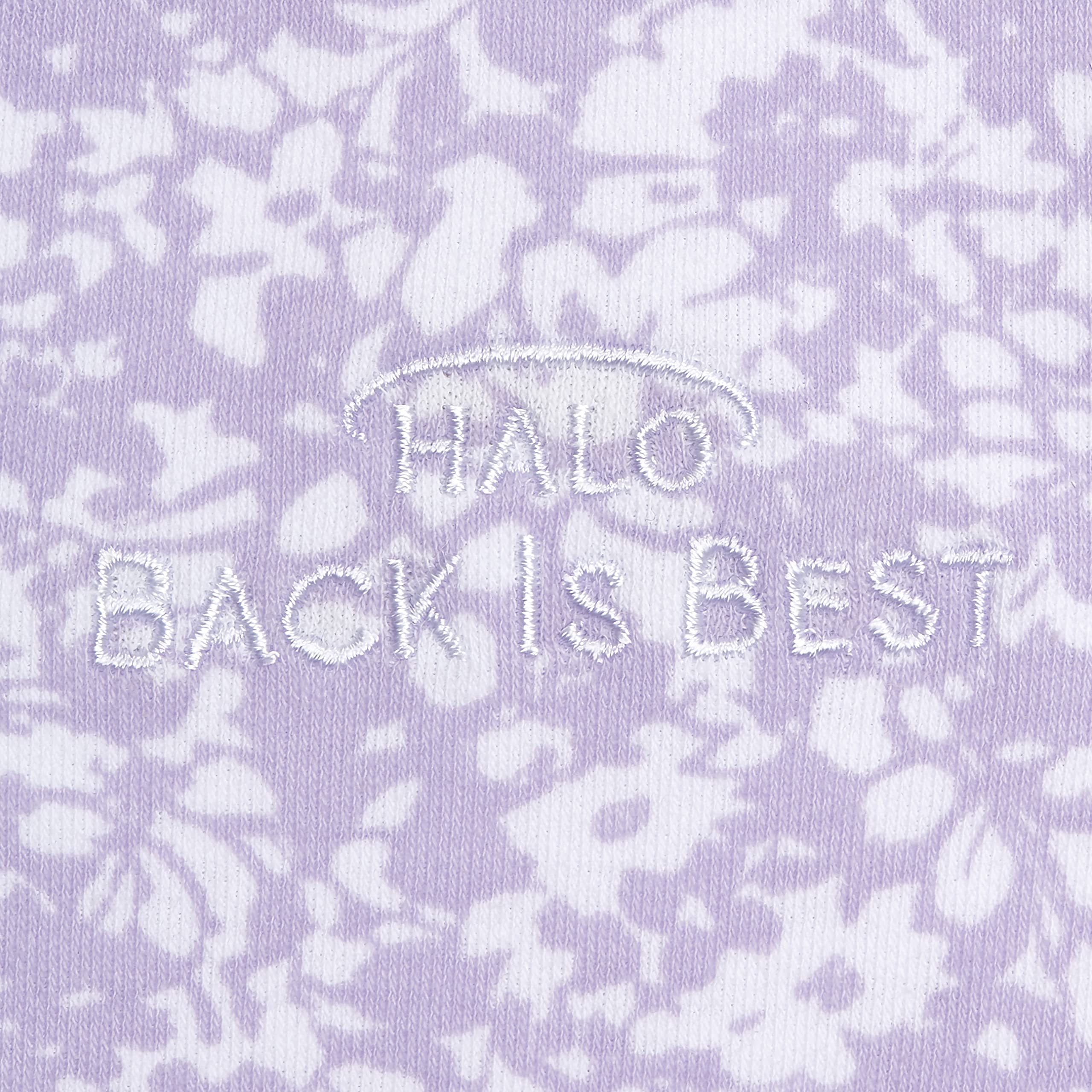 Baby wearing HALO SleepSack during sleep for safe layering and comfort.
