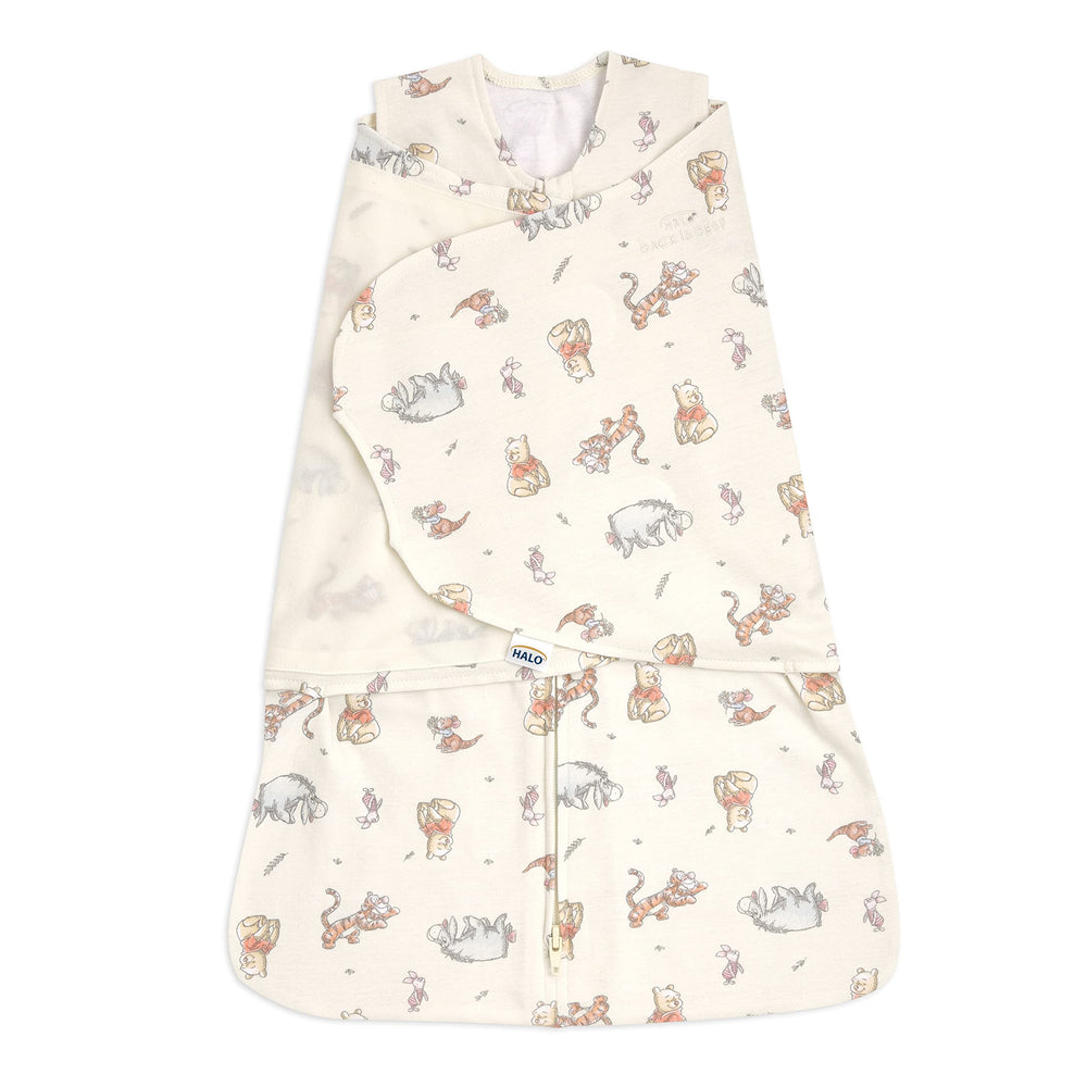 HALO Winnie Frolic Sleepsack front view shows snug, secure fit for newborn swaddling.