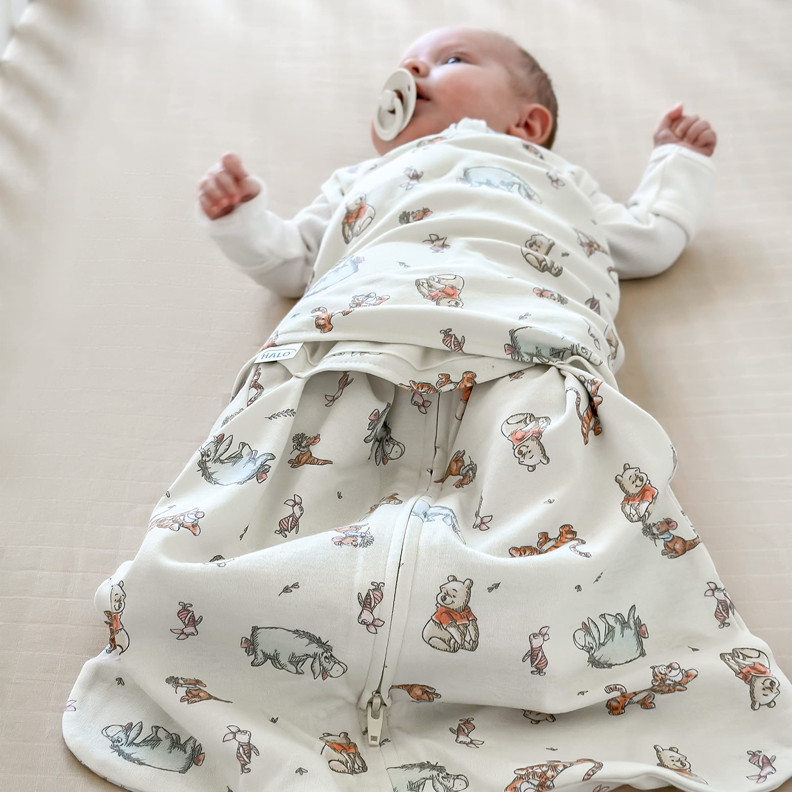 HALO Winnie Frolic Sleepsack inverted zipper makes diaper changes easy.