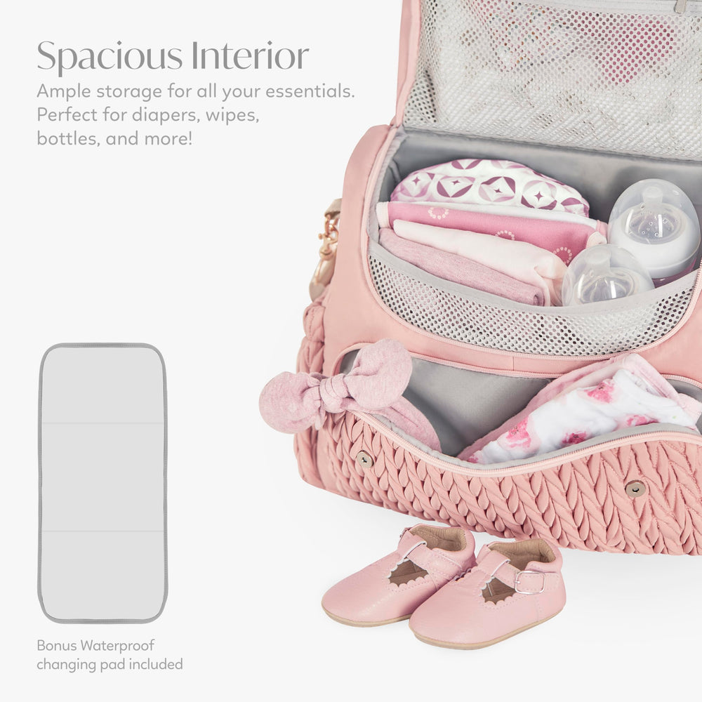Hannah & Sophia Belle quilted pink fabric adds timeless style and durability.