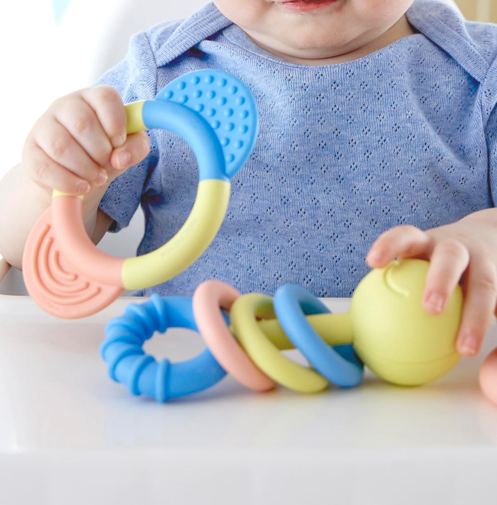 Hape ring rattle encouraging play with gentle sounds during early exploration