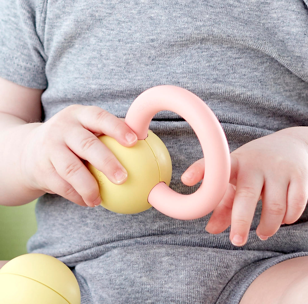 Hape soft colors stimulate baby's visual interest during play