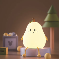 HAPPYBAG pear night light in silicone provides a gentle glow for bedtime ambience