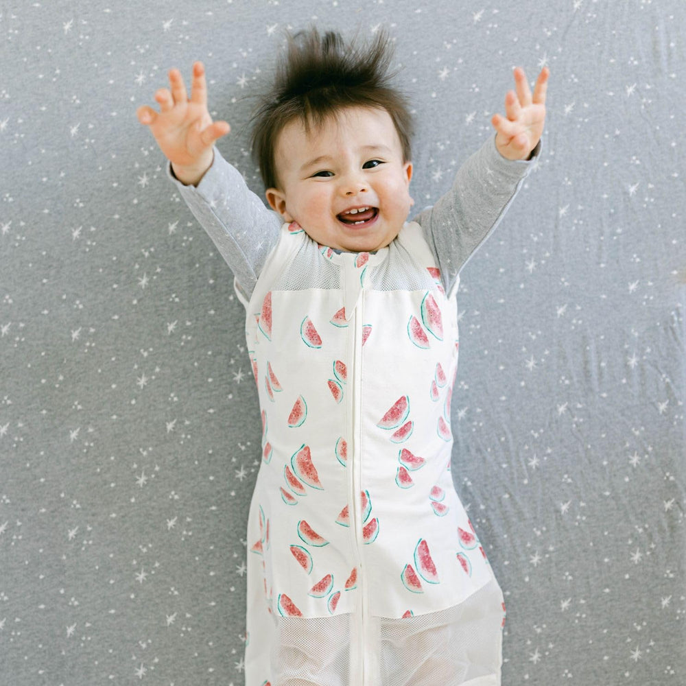 Happiest Baby Sleepea inner flaps support gentle, self-soothing swaddling.