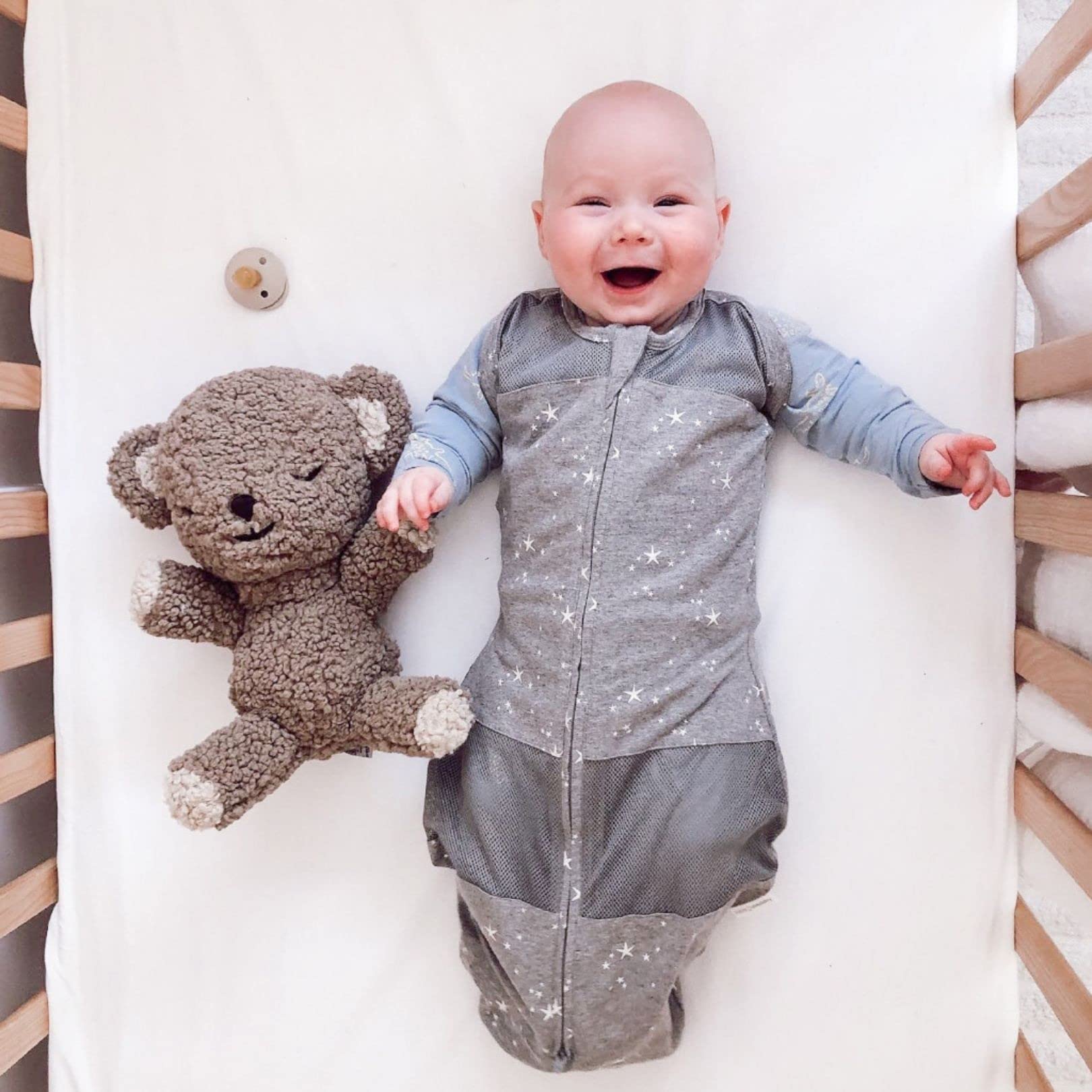 Happiest Baby Sleepea inner flaps provide snug support during sleep for transitional swaddling.