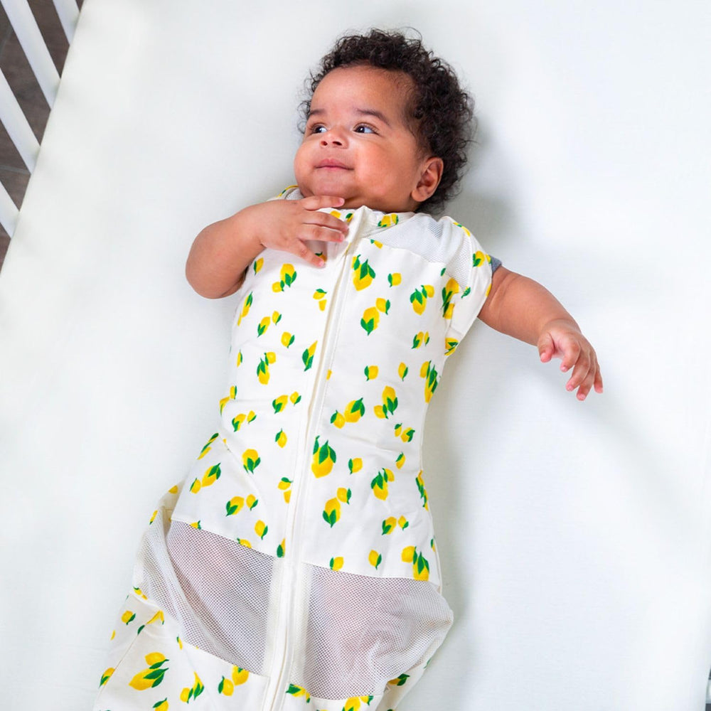 Happiest Baby Sleepea swaddle arms-out option for gentle transition to independent sleep.