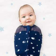 Happiest Baby Sleepea teal stars medium view with arm openings for flexible sleep