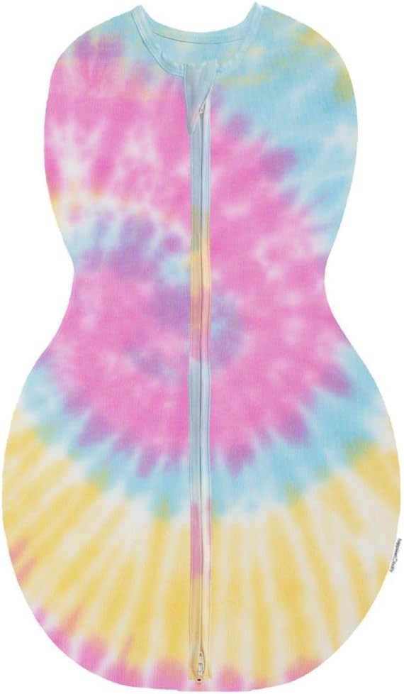 Happiest Baby Sleepea tie-dye rainbow swaddle promotes snug comfort and safe hip positioning.