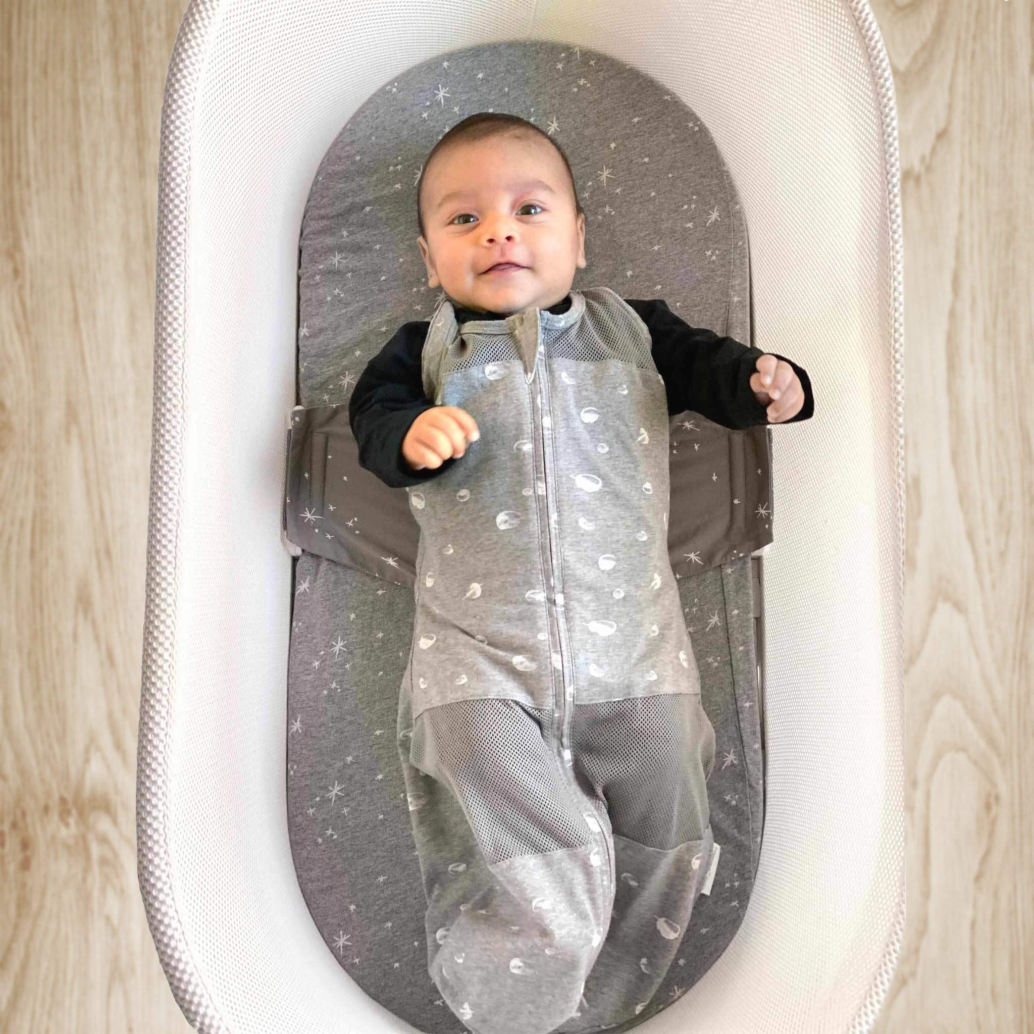 Happiest Baby SNOO Sleep Sack on back-sleep position with secure fit.