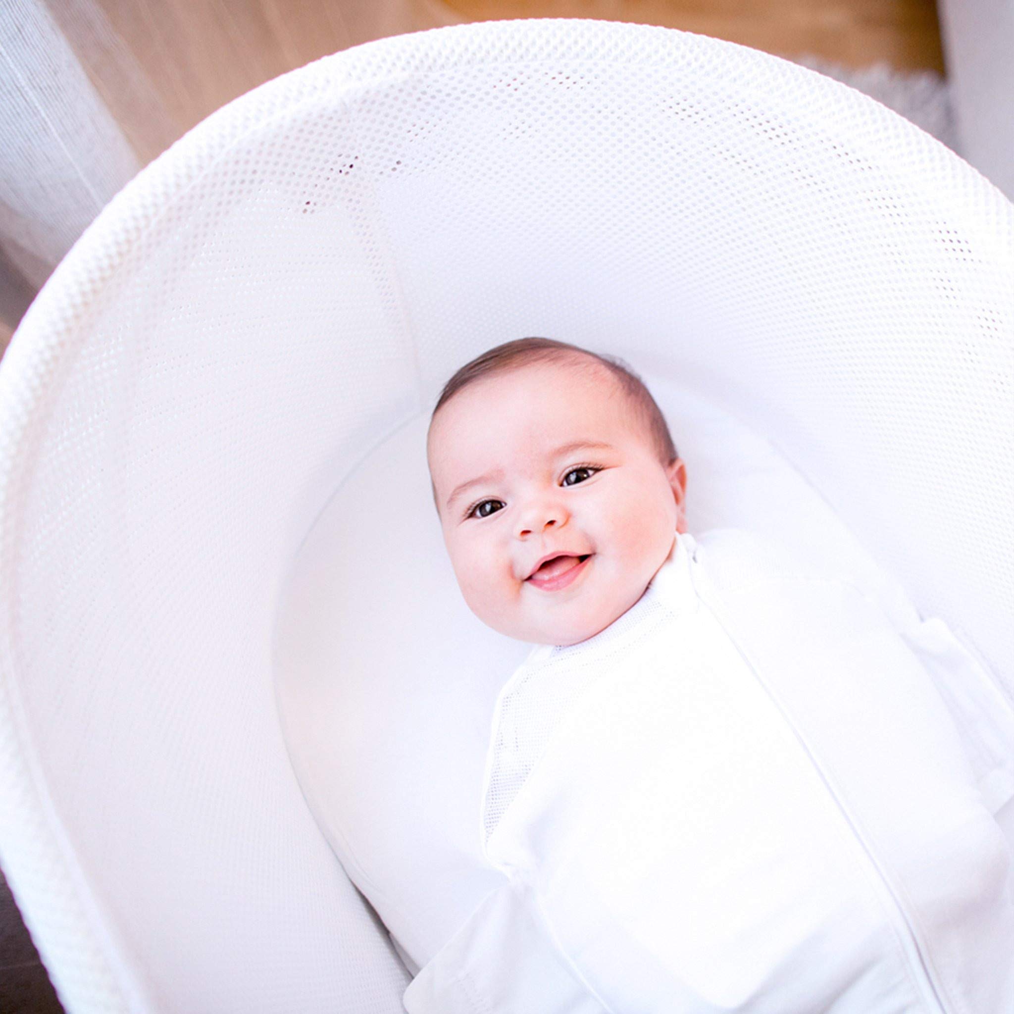 Happiest Baby SNOO Sleep Sack teal planets 3-pack on display for bundle option.