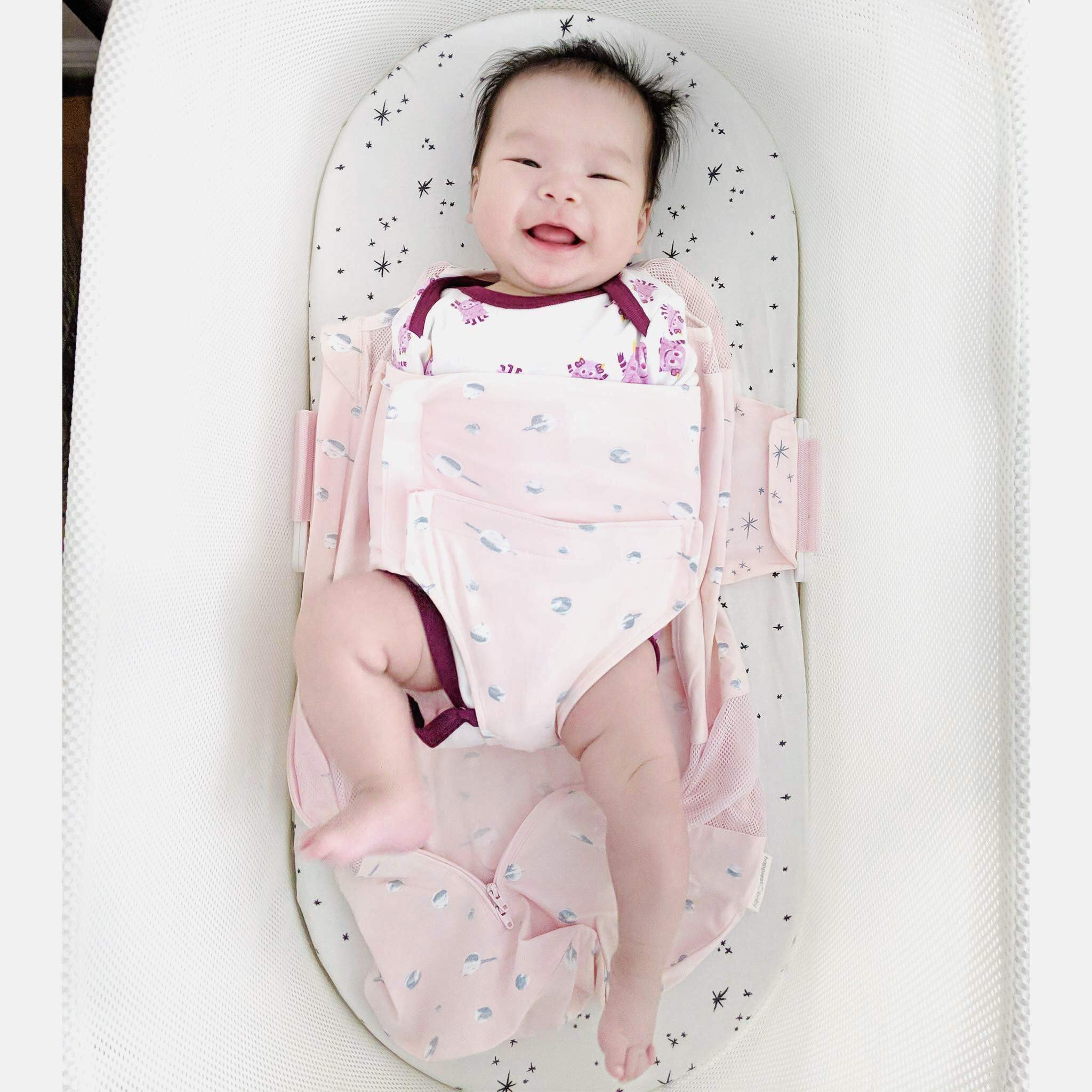 Happiest Baby SNOO Sleep Sack Velcro closure detail emphasizing quiet, escape-proof security.