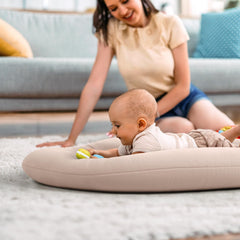 Happle sunny baby lounger highlights recessed center for neutral posture.