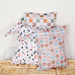 Happy Flute travel wet bag protects clothes and reduces mess on trips with lattice design.