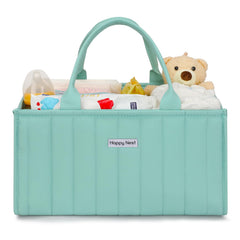 HAPPY NEST mint green diaper caddy keeps diapers and wipes within easy reach.