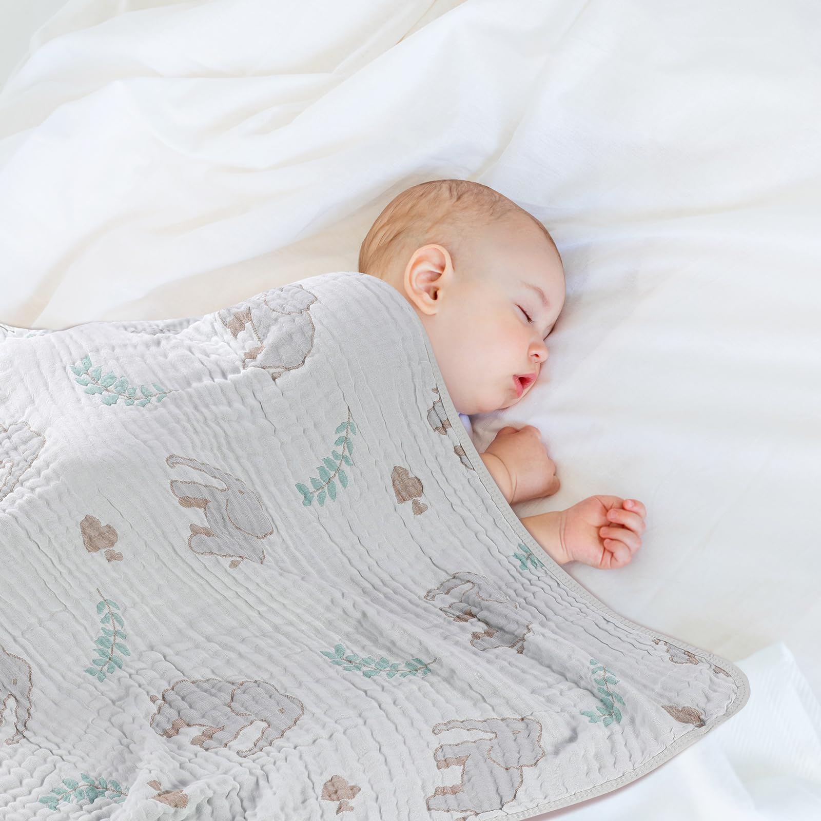 HardNok Forest Elephant blanket swaddling scene demonstrates gentle, breathable coverage.