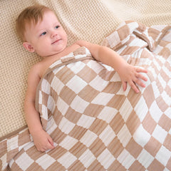 HardNok Ultra Soft Muslin Blanket stroller cover providing breathable shade on outings.