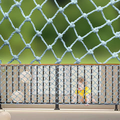 HARERNET stair safety net installed on balcony railing to help protect kids