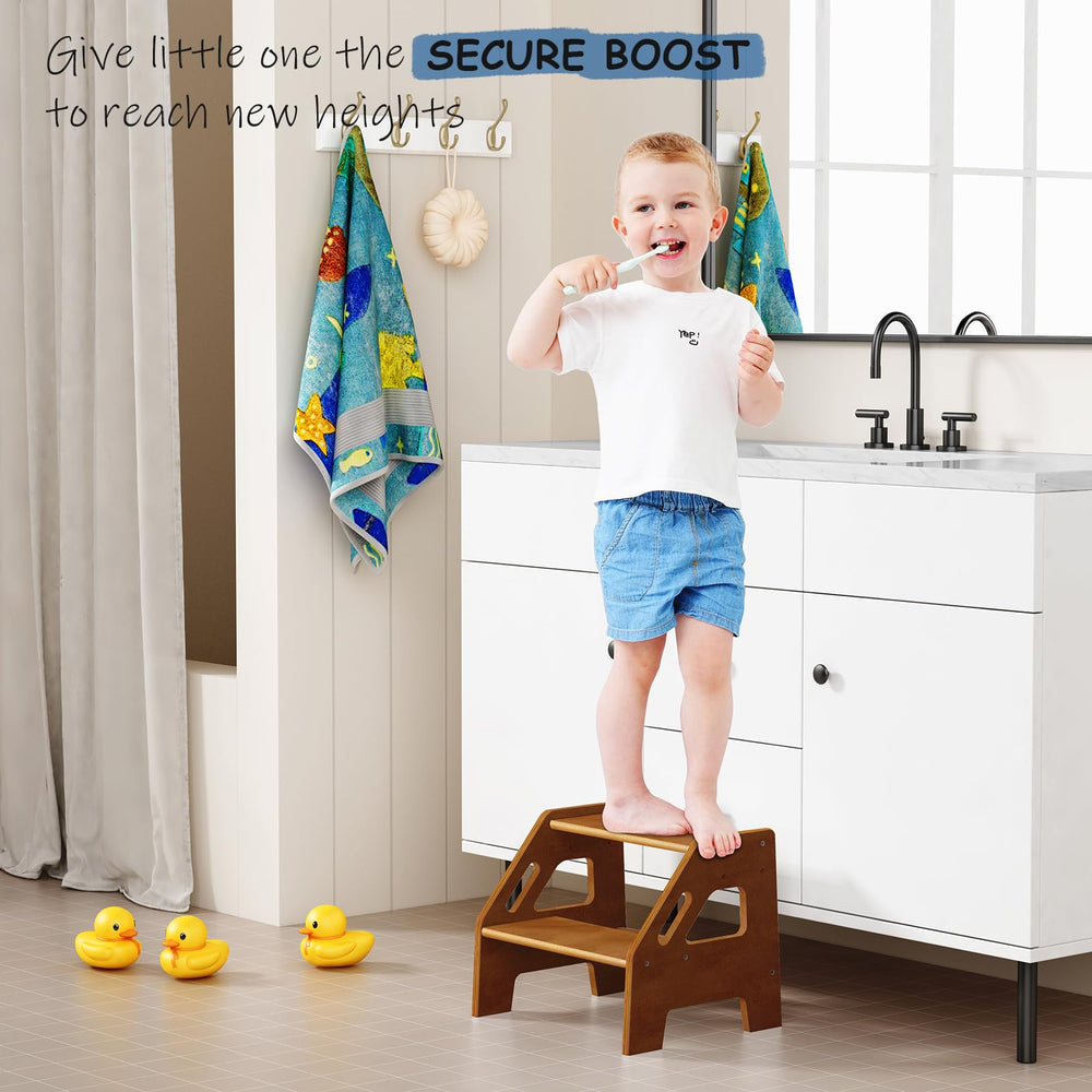 Harwaya walnut brown toddler step stool supports brushing teeth at the sink.