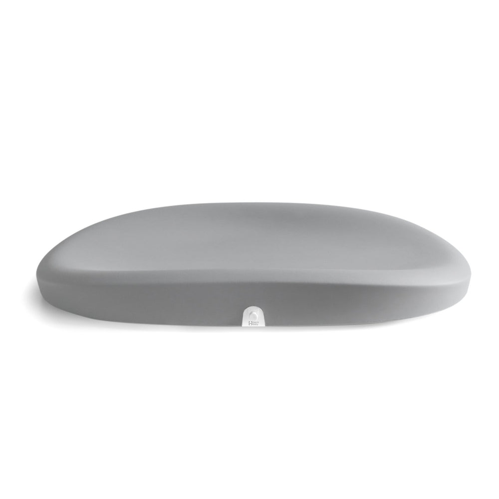 Hatch Grow changing pad in grey, closed view showing compact design