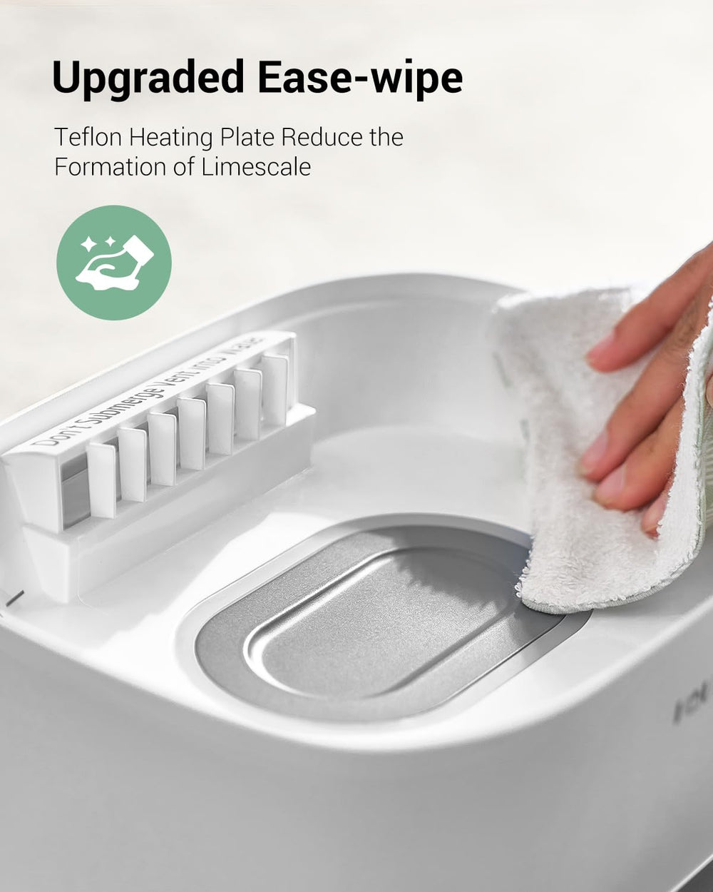 HAUTURE sterilizer with compartments for pacifiers and parts.