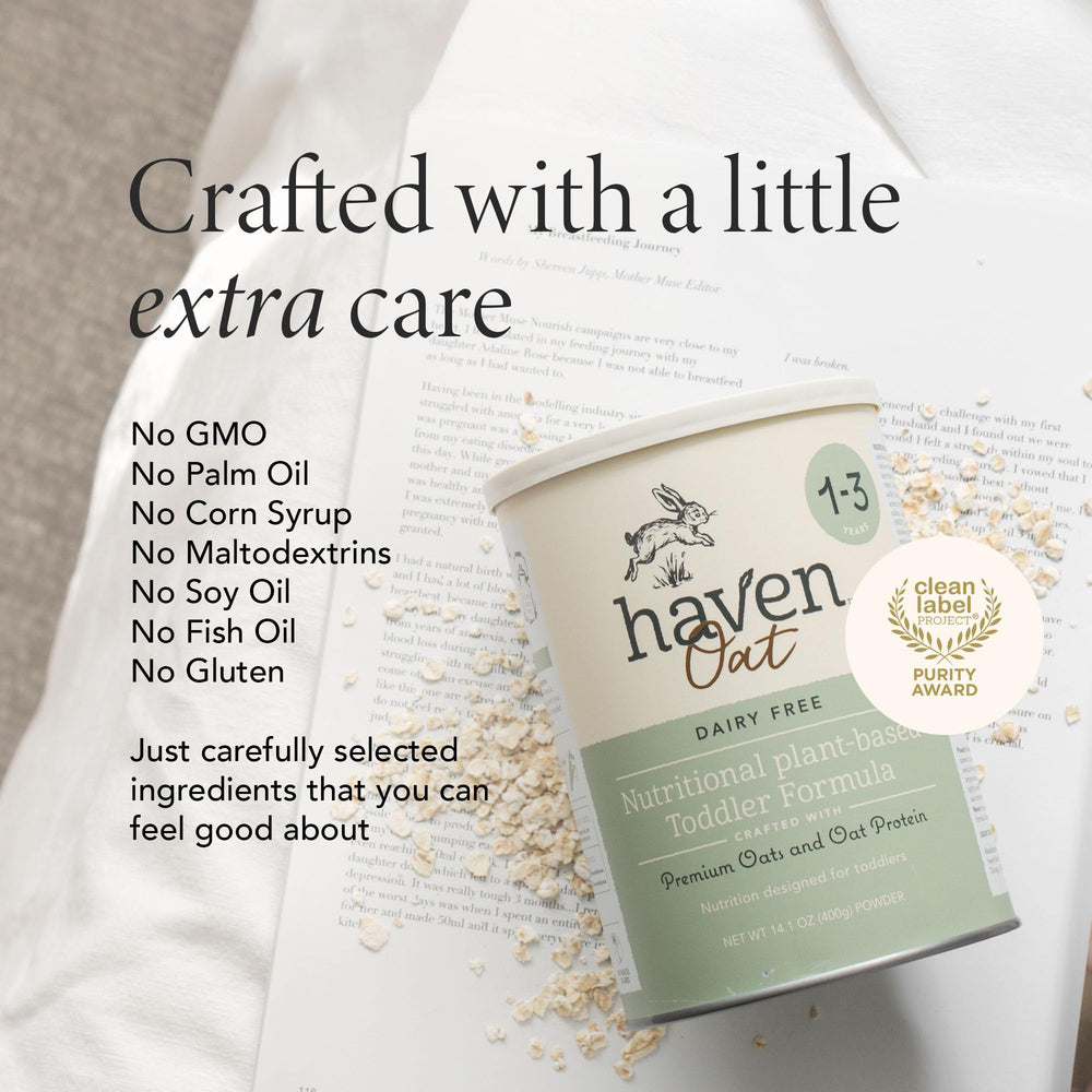 Haven OatToddler Formula powder being scooped for easy meals