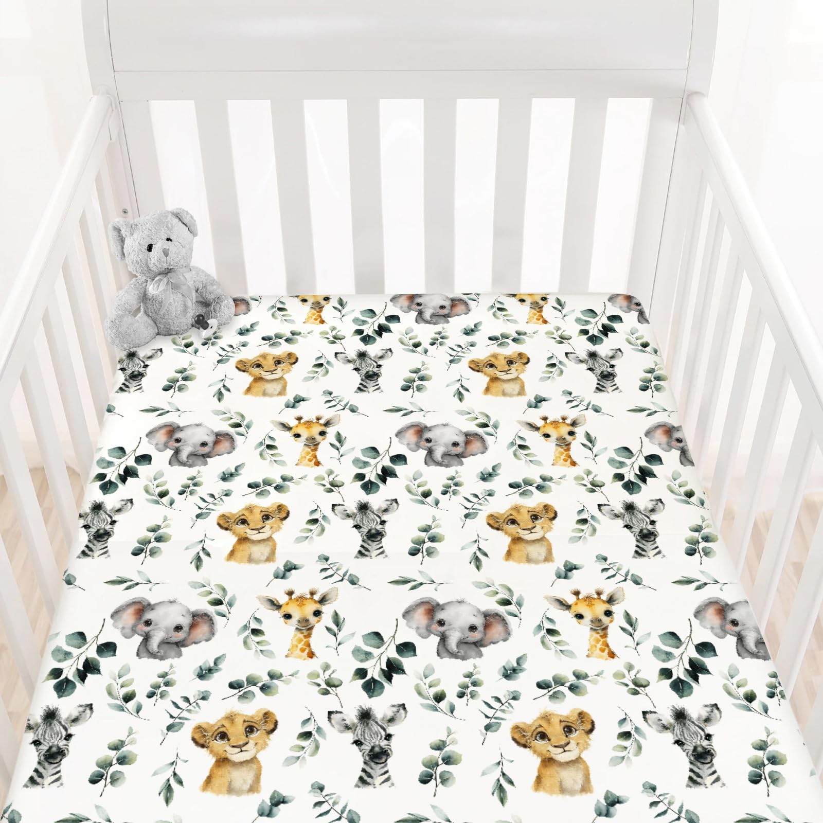 HawSkgFub African Safari animal leaf print crib sheet secures a snug fit and playful style.