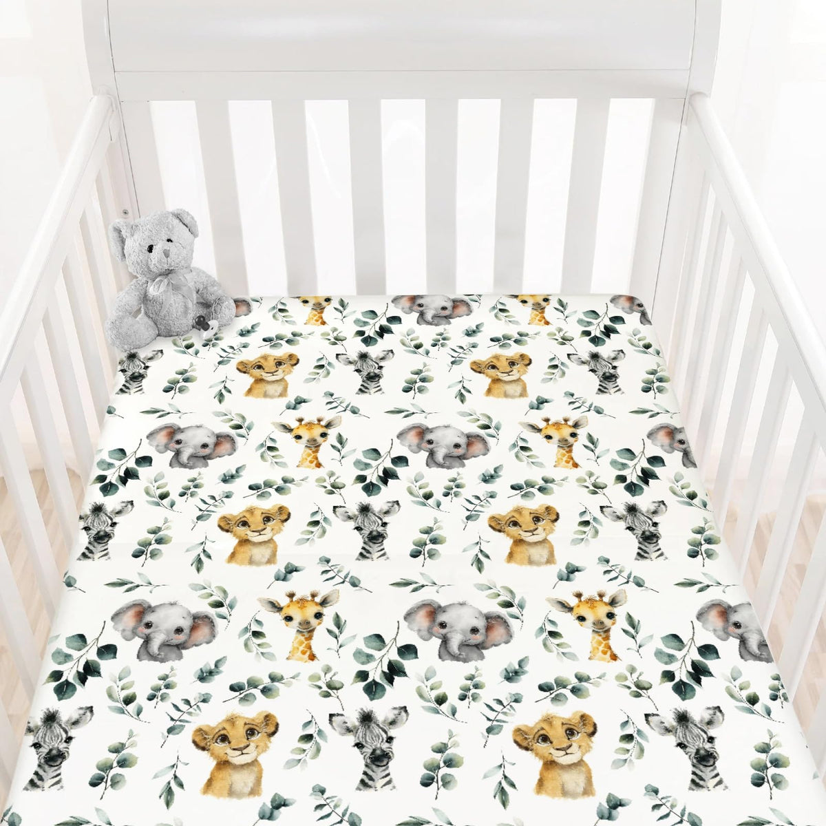 HawSkgFub African Safari animal leaf print crib sheet secures a snug fit and playful style.