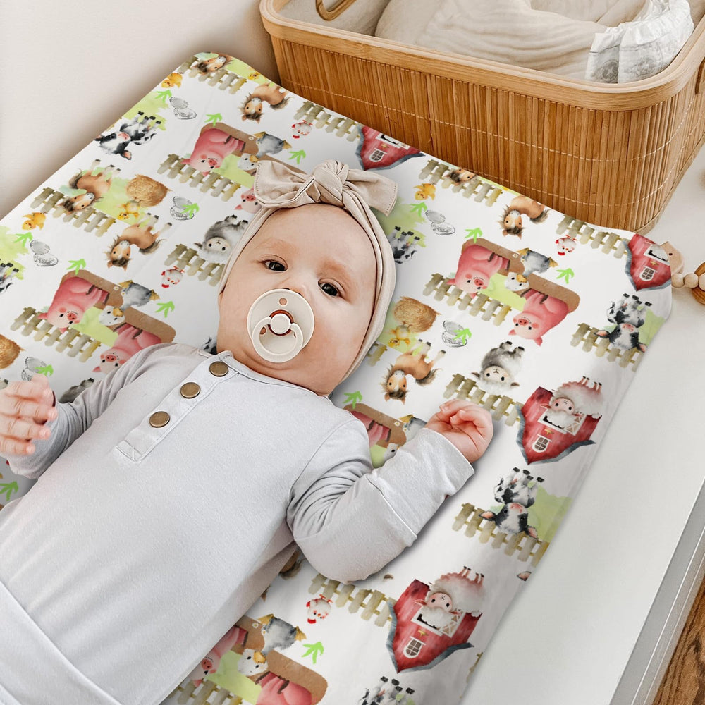 HawSkgFub easy-install elastic-band changing pad cover stays in place.