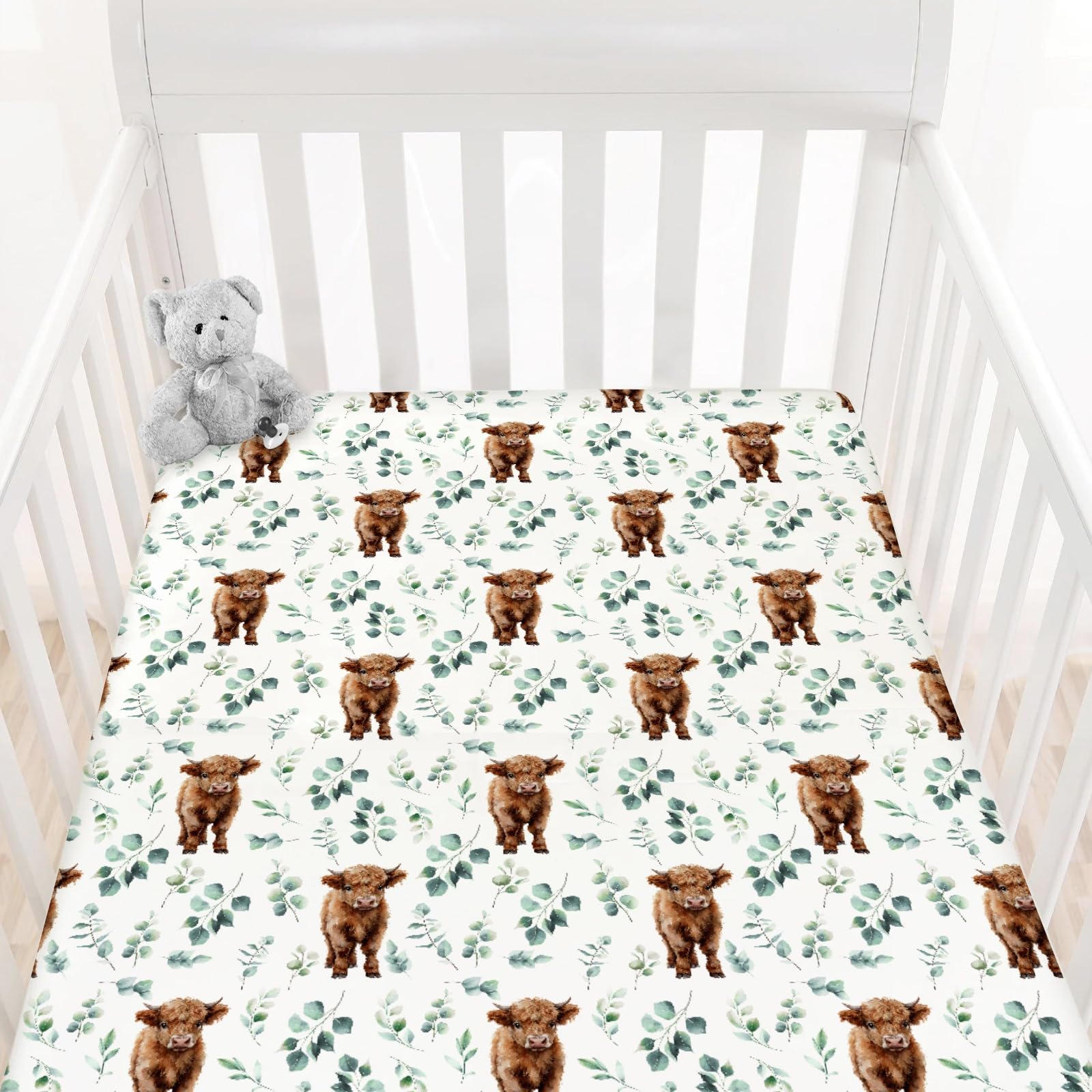 HawSkgFub Highland Cow Eucalyptus Leaf crib sheet offers a snug fit for secure sleep