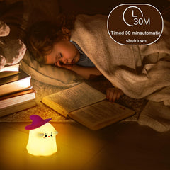 Hbaushun Ghost Night Light charging via USB-C for quick, convenient power.