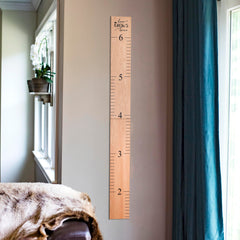 Black numerals on Headwaters growth chart for clear height readings.