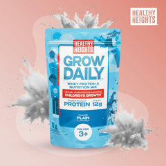 Healthy Heights Grow Daily scoop beside plain protein powder for easy portioning