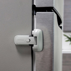 Heart of Tafiti fridge lock demonstrates kid safe use on a fridge door