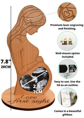 Heart's Sign sonogram frame in laser-engraved wood design.