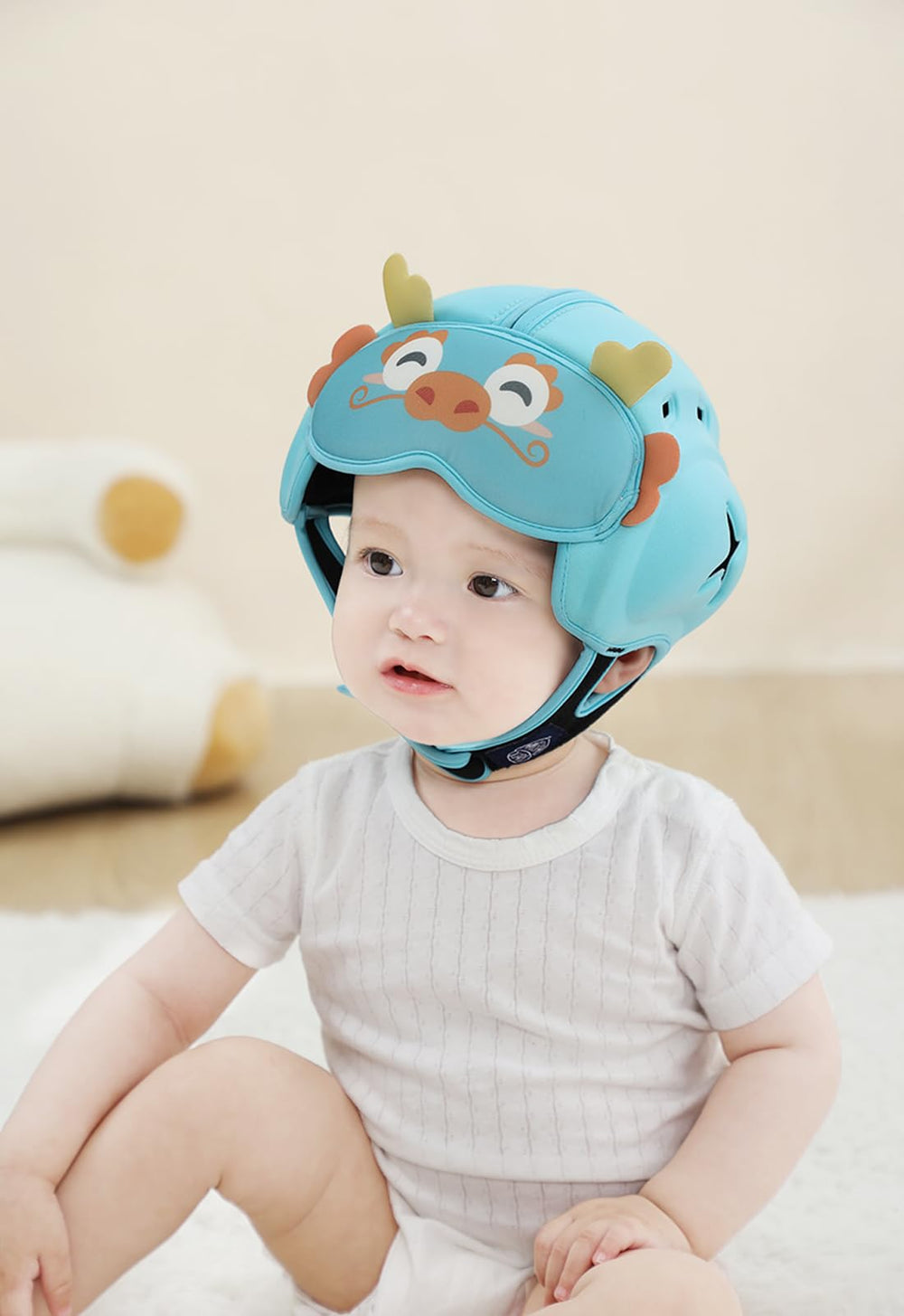 HECCEI Mambobaby dragon helmet side view highlighting soft padding and safe design.
