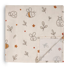 HECCEI muslin swaddle blanket close-up showing soft, breathable fibers for newborn comfort.